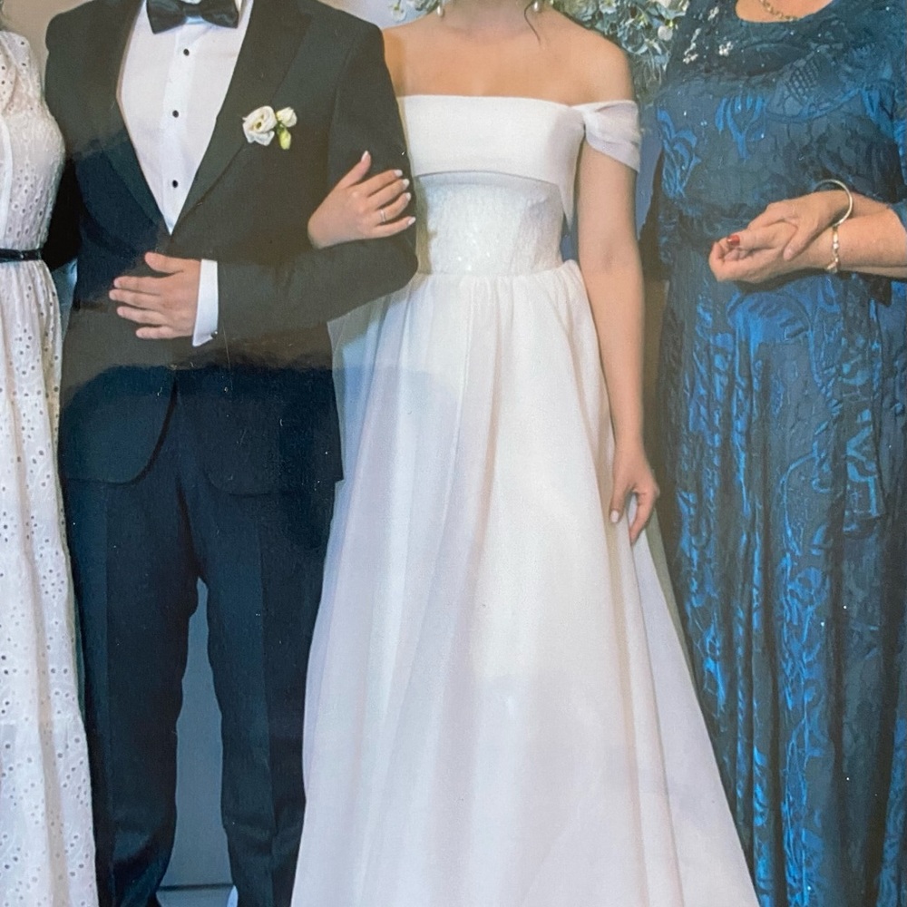 Beautiful wedding gown off shoulder